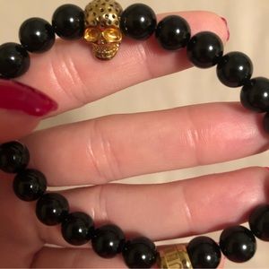 Like New North Skull Mens Onyx and Gold Bracelet